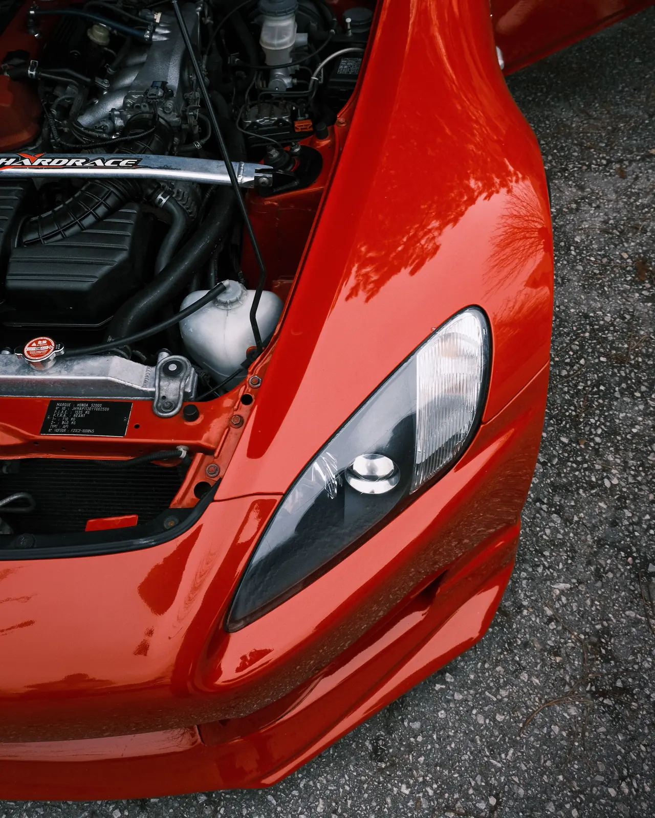 Gloss red front guard and headlight after paint
